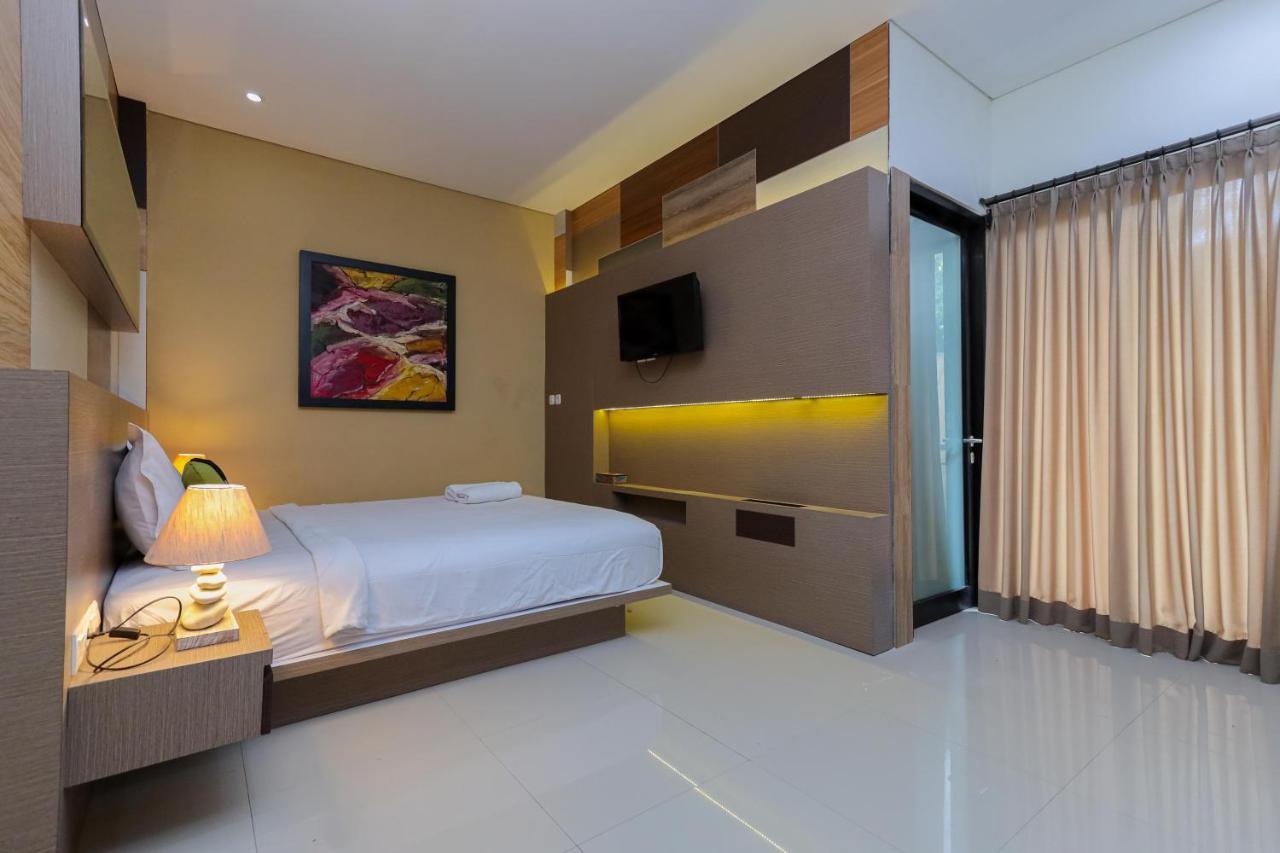 Urbanview Hotel Wg Jimbaran Bali 乌干沙 外观 照片